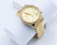 7. Michael Kors Women’s Gold-Tone Watch