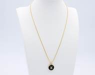 30. Louis Vuitton Charm Necklace