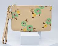 3. Coach Floral Wristlet