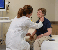 A Hannibal Regional therapist examines a patient.